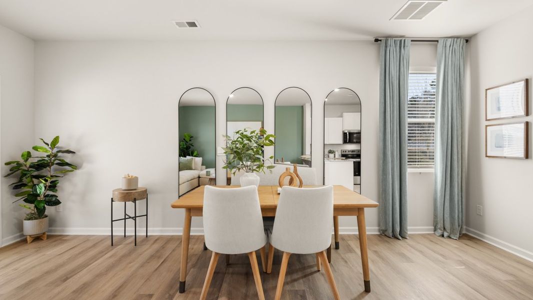 Furnished interior in a model home at Roseleigh Park in Douglasville (Image 7).