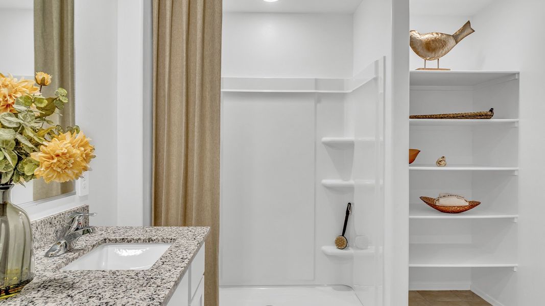 Furnished interior in a model home at Senita Crossing in Tucson (Image 38).