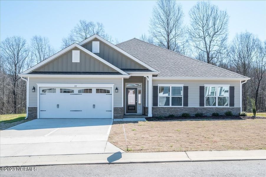Front exterior of a home in the Waverly Place community, located in Richlands, NC (Image 4).