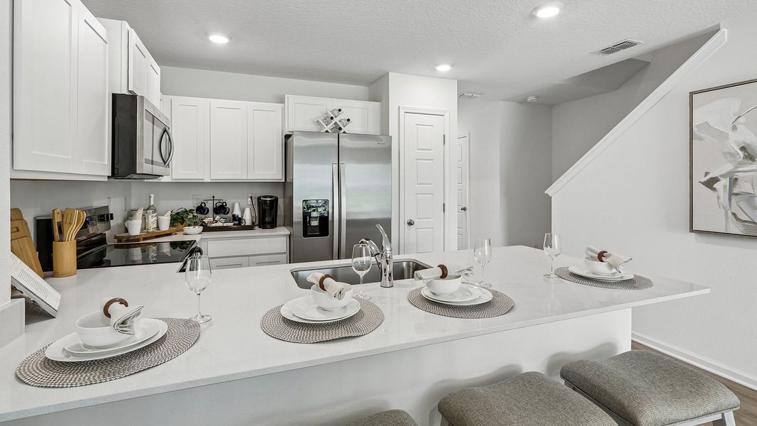 Furnished interior in a model home at Corsair in Middleburg (Image 11).