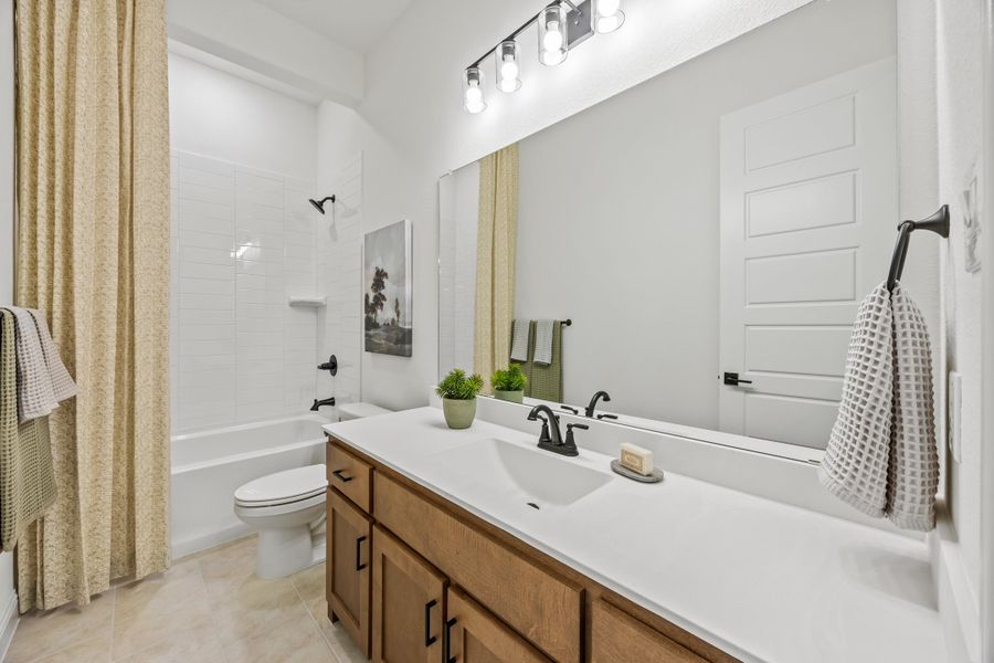 Furnished interior in a model home at Paloma Ranch in New Fairview (Image 28).