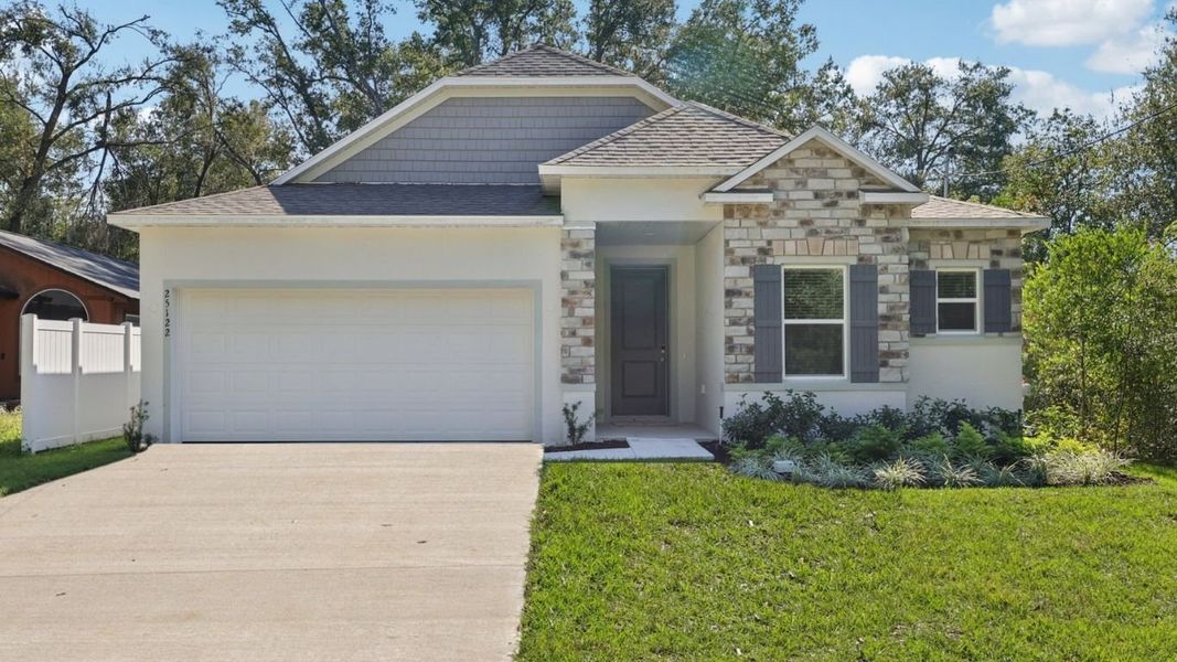 Front exterior of a home in the Canterwood Acres community, located in Ocala, FL (Image 3).