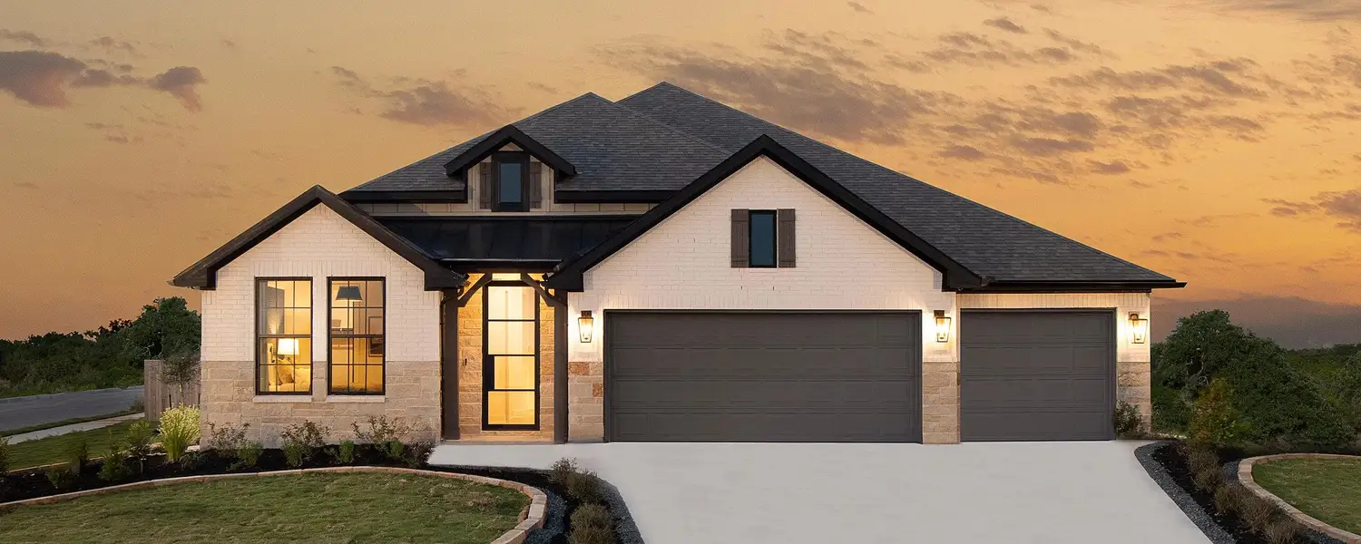 Front exterior of a home in the The Heritage at Saddlebrook Ranch 70's community, located in Schertz, TX (Image 2).