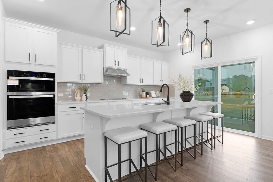 Furnished interior in a model home at Halls Grove in Fuquay Varina (Image 2).
