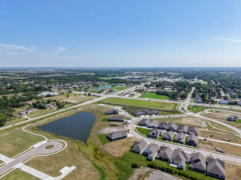 Aerial view of the The Courtyards at Cornerstone community in Andover, KS, showing layout and nearby surroundings (Image 1). Aerial view of the The Courtyards at Cornerstone community in Andover, KS, showing layout and nearby surroundings (Image 1).