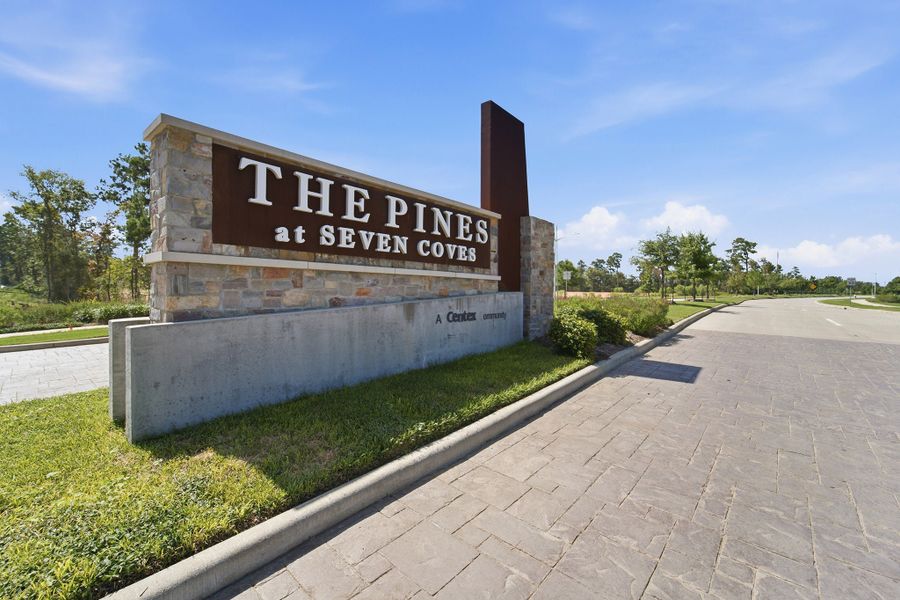Entrance to the The Pines at Seven Coves community in Willis, TX, featuring signage and landscaping (Image 2).