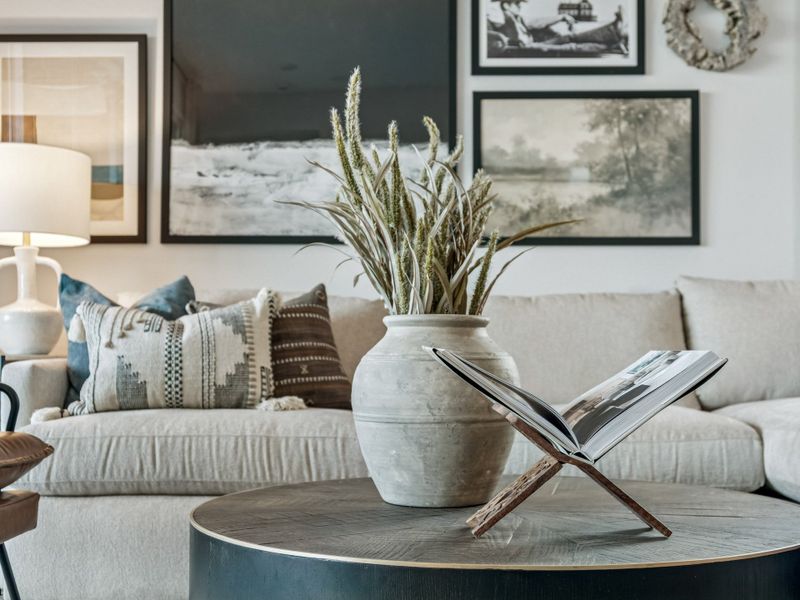 A vase with flowers on a table.