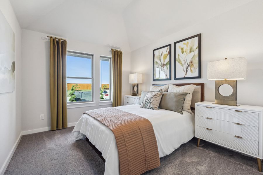 REPRESENTATIVE PHOTO – Bedroom in a Diamond model home by Trophy Signature Homes