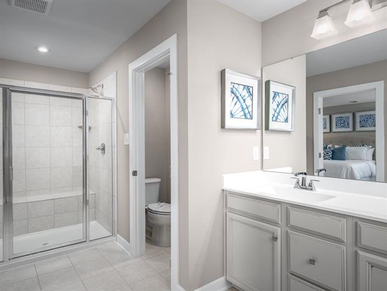 An owner’s bath that feels new—because it is—with plenty of closet space to match.