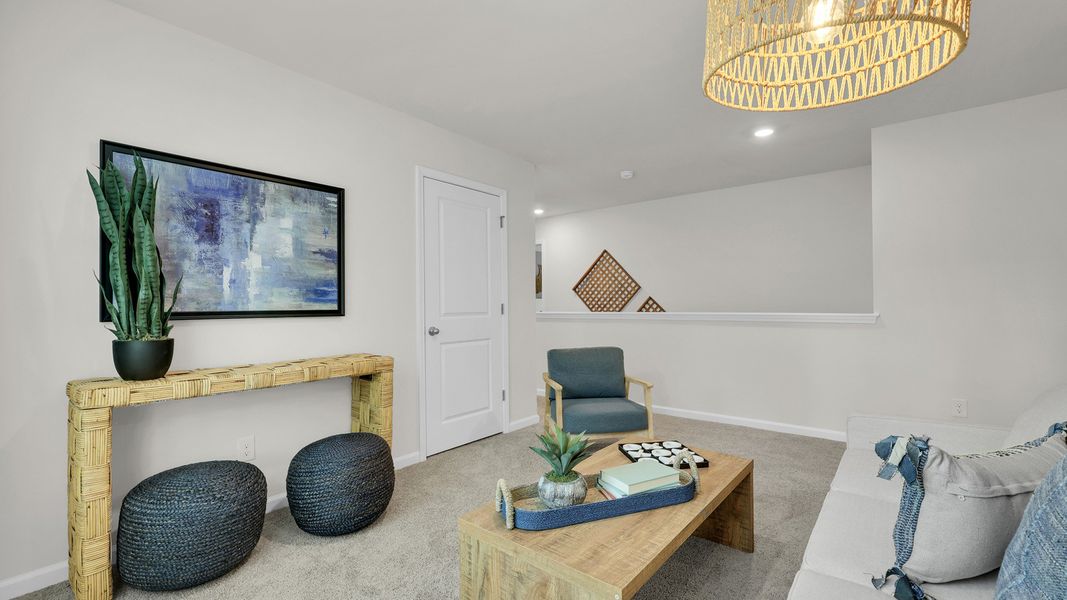 Furnished interior in a model home at The Cove at Mallard Crossing in Summerville (Image 25).