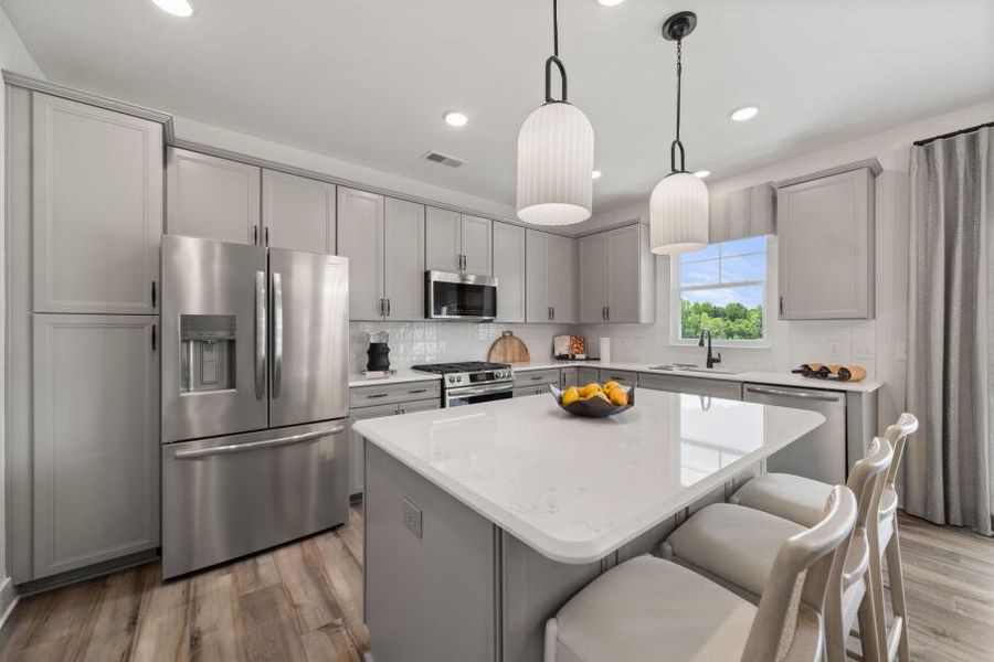 Furnished interior in a model home at Hayes Village in Greensboro (Image 5).