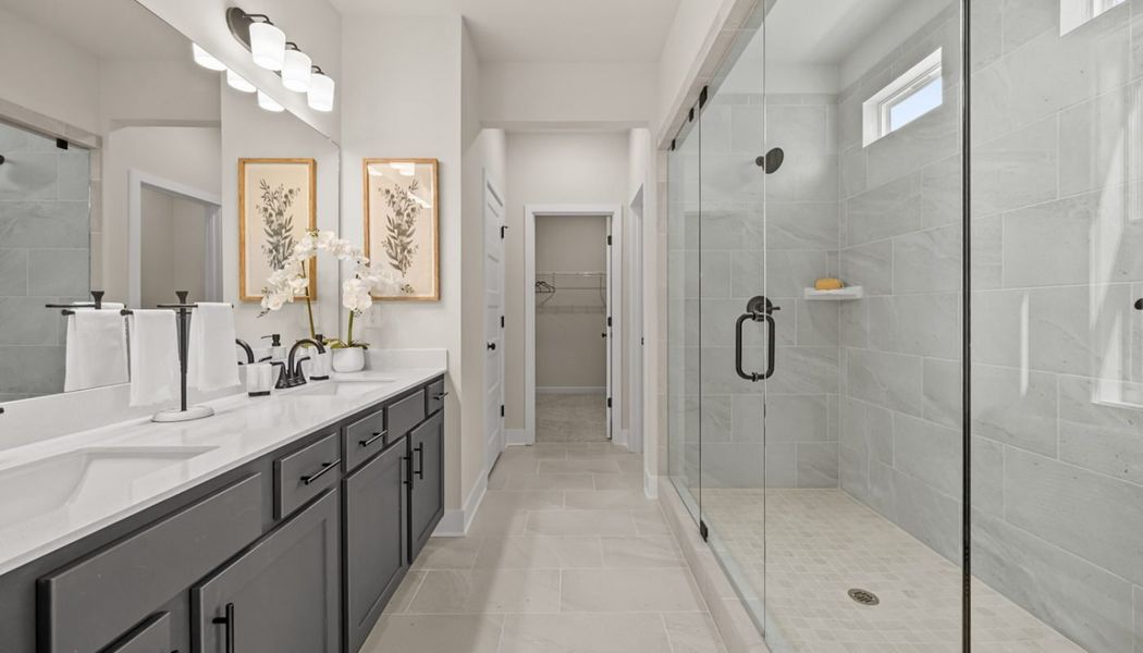 Furnished interior in a model home at Rosewood Lake Preserve in Hoschton (Image 26).