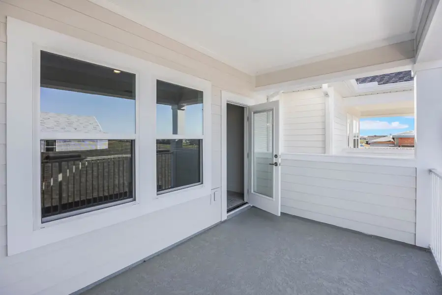 Exterior details of a home in Harvest at Ovation - Townhomes, Winter Garden (Image 46).