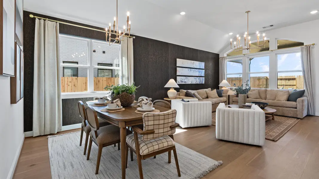 Furnished interior in a model home at Wildrye in Waller (Image 7).