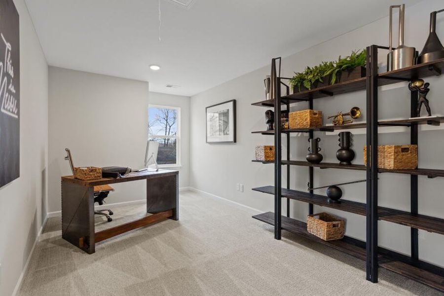 Furnished interior in a model home at East Main Townes in Spartanburg (Image 28).