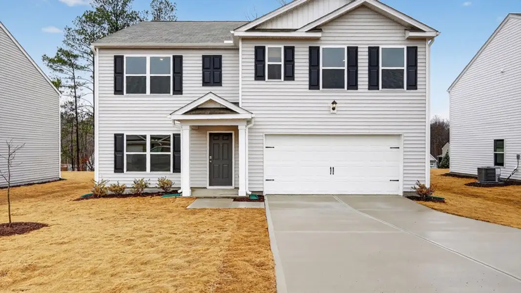 Front exterior of a home in the Mangum Farms community, located in Stem, NC (Image 8).