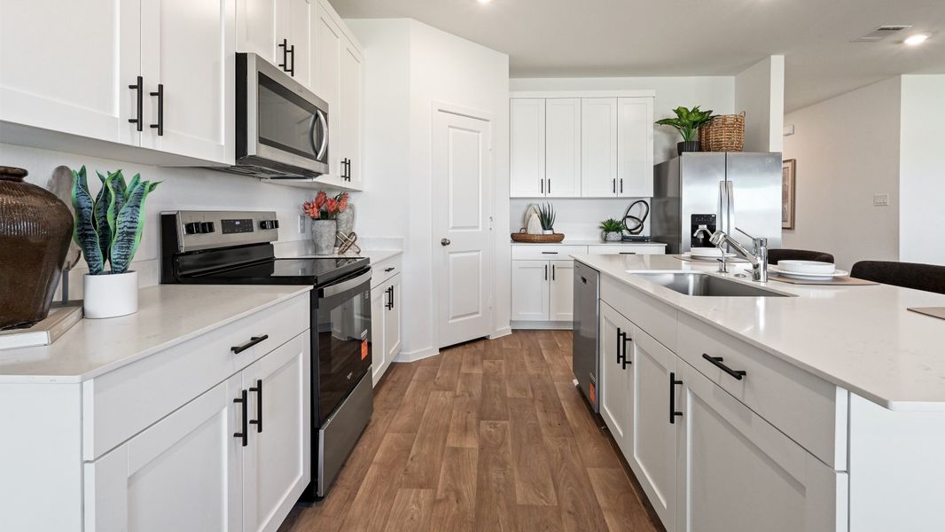 Furnished interior in a model home at Westward Pointe in Sealy (Image 32).