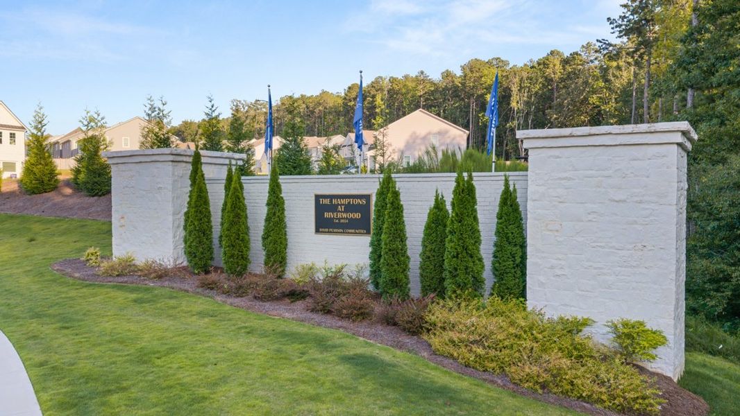 Entrance to the Hamptons at Riverwood South community in Dallas, GA, featuring signage and landscaping (Image 12).