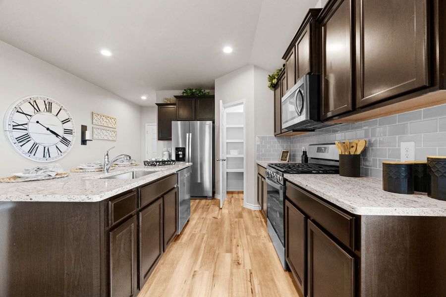 Furnished interior in a model home at Saratoga Crossing in Corpus Christi (Image 6). Furnished interior in a model home at Saratoga Crossing in Corpus Christi (Image 6).