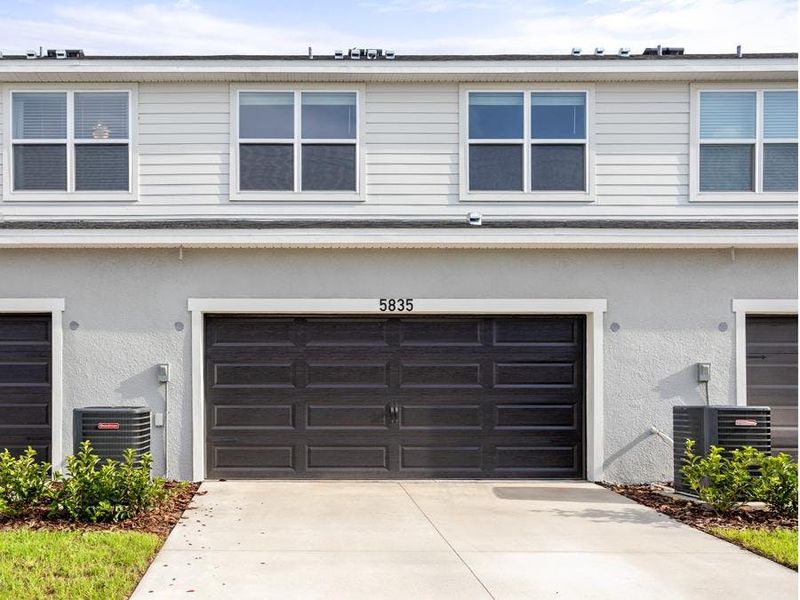 These townhomes feature an attached, alley-access 2-car garage.