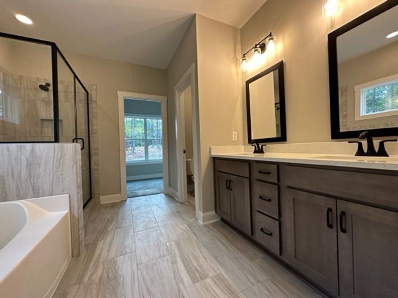 Furnished interior in a model home at Polk Place in Moreland (Image 17).