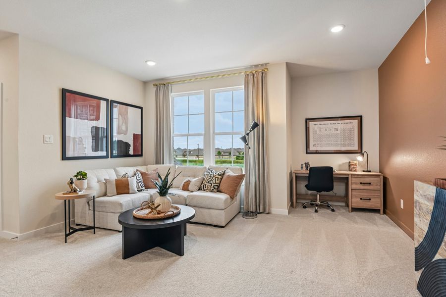 A living room with a couch and a coffee table.