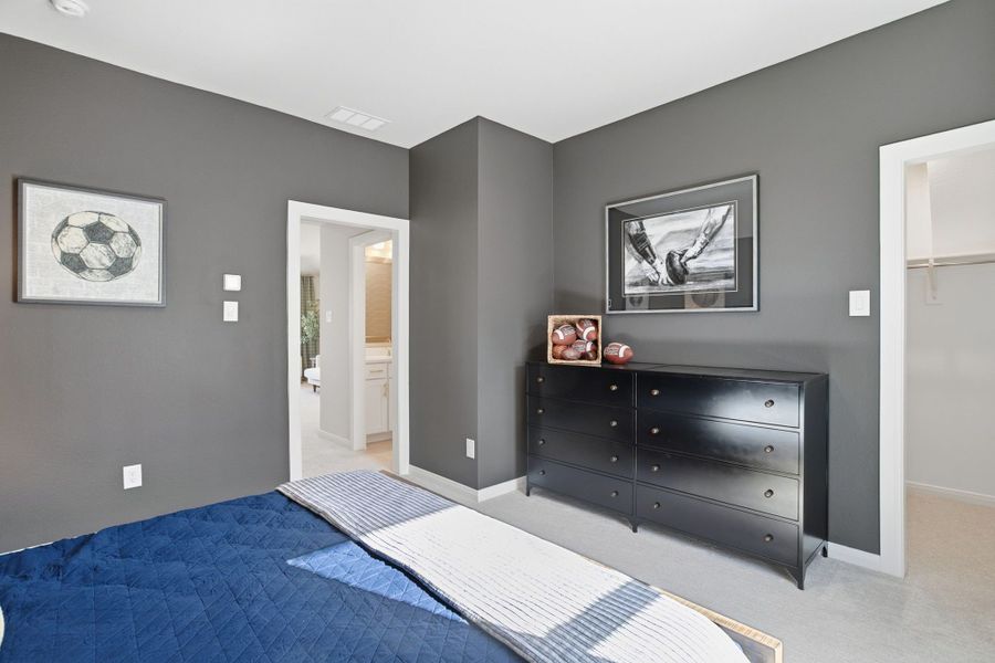 Furnished interior in a model home at Lily Creek at Sutton Fields in Aubrey (Image 50).