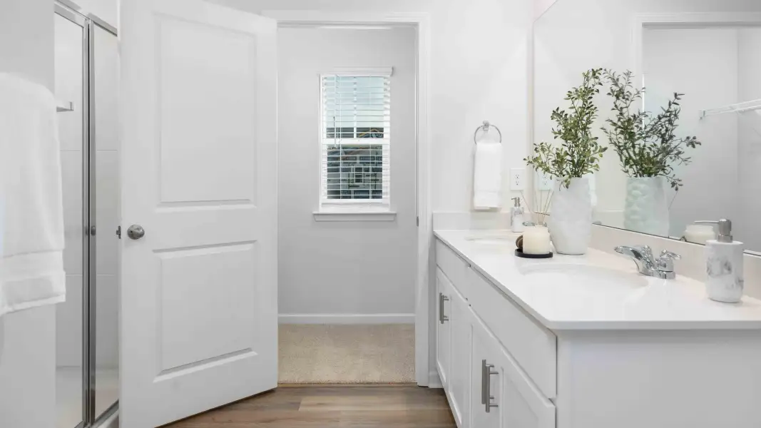 Furnished interior in a model home at Sweetwater Village in Rockwell (Image 20).