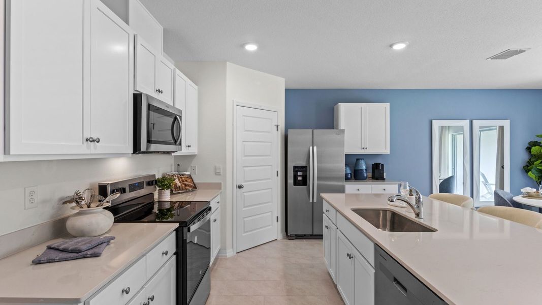 Furnished interior in a model home at Sun N Lake in Sebring (Image 8).