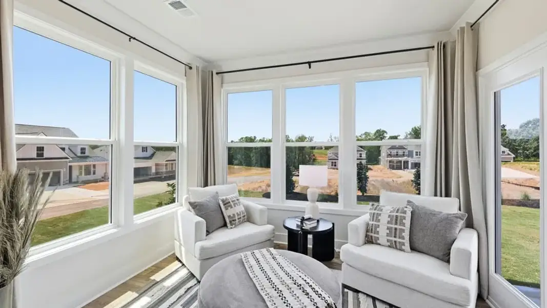 Furnished interior in a model home at Spring Ridge Reserve in Anderson (Image 22).
