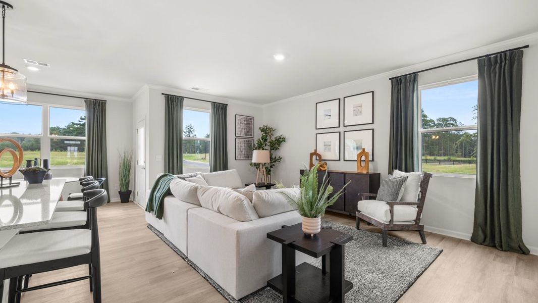 Furnished interior in a model home at Fairway 17 at Mirror Lake in Villa Rica (Image 24).