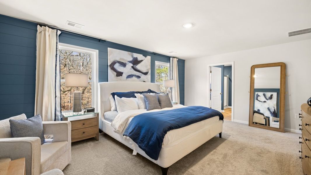 Furnished interior in a model home at Liberty Crossing in Braselton (Image 16).