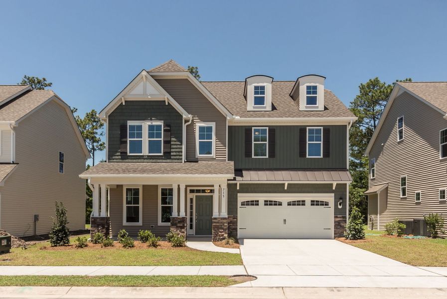 Front exterior of a home in the Melton Oaks - Robuck Homes community, located in Garner, NC (Image 10). Front exterior of a home in the Melton Oaks - Robuck Homes community, located in Garner, NC (Image 10).