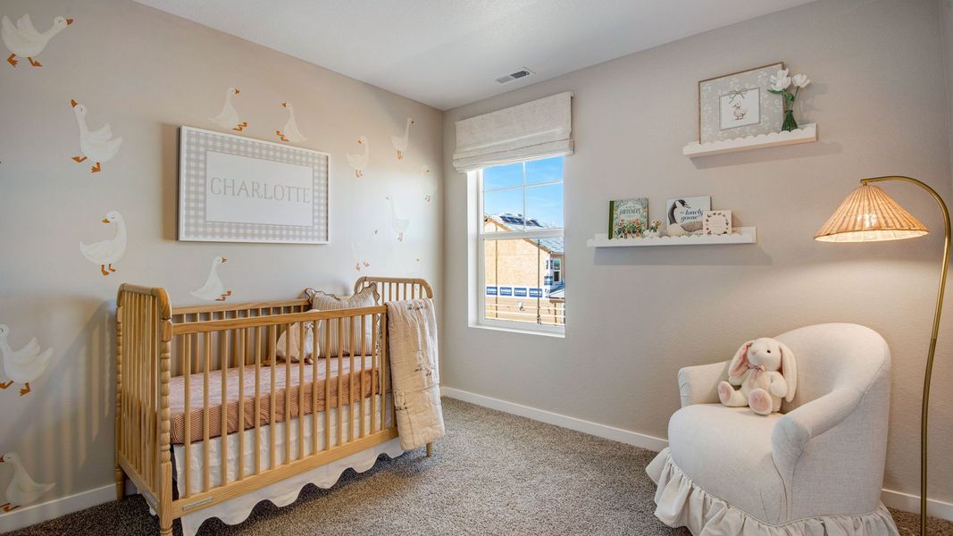 Furnished interior in a model home at Sky Ranch in Watkins (Image 29).