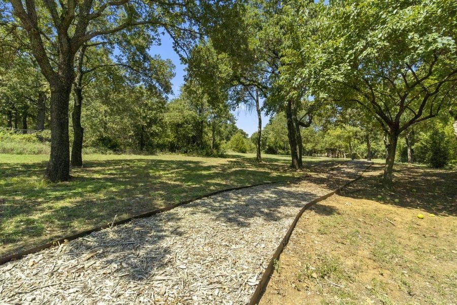 Image 17 of the Shadow Creek Estates community in Hickory Creek, TX.