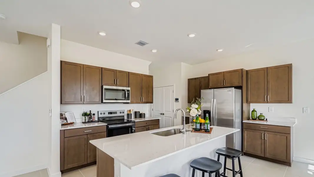 Furnished interior in a model home at Baywood II in Florida City (Image 3).