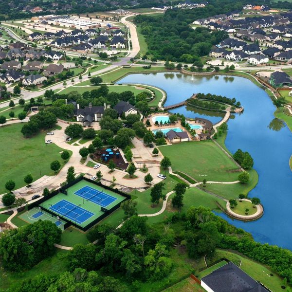 Aerial view of the Mustang Lakes community in McKinney, TX, showing layout and nearby surroundings (Image 1). Aerial view of the Mustang Lakes community in McKinney, TX, showing layout and nearby surroundings (Image 1).
