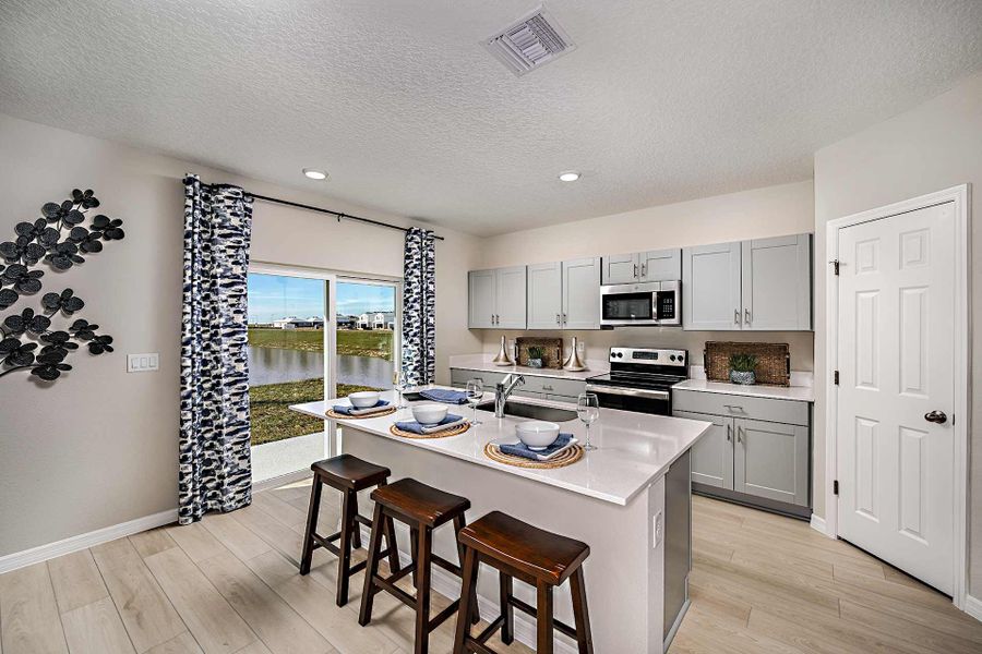 Furnished interior in a model home at Scenic Terrace in Haines City (Image 19).