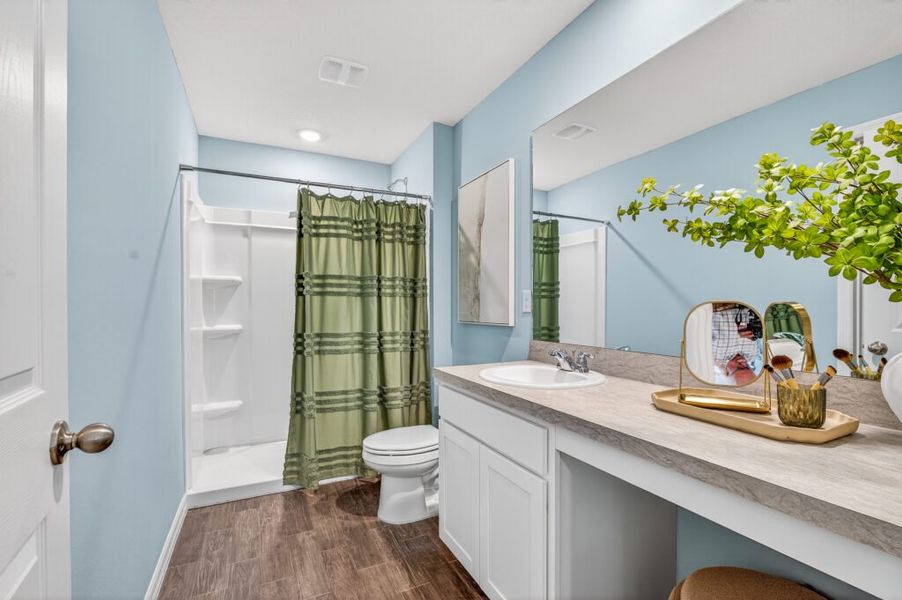 Furnished interior in a model home at Mallard Landing in Okeechobee (Image 14).
