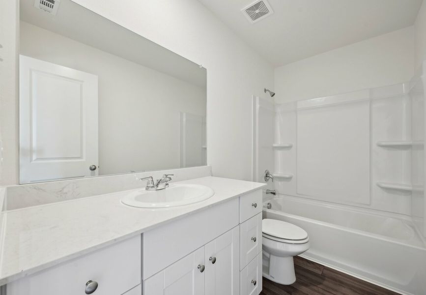 Furnished interior in a model home at Stonebrooke in Conroe (Image 14).