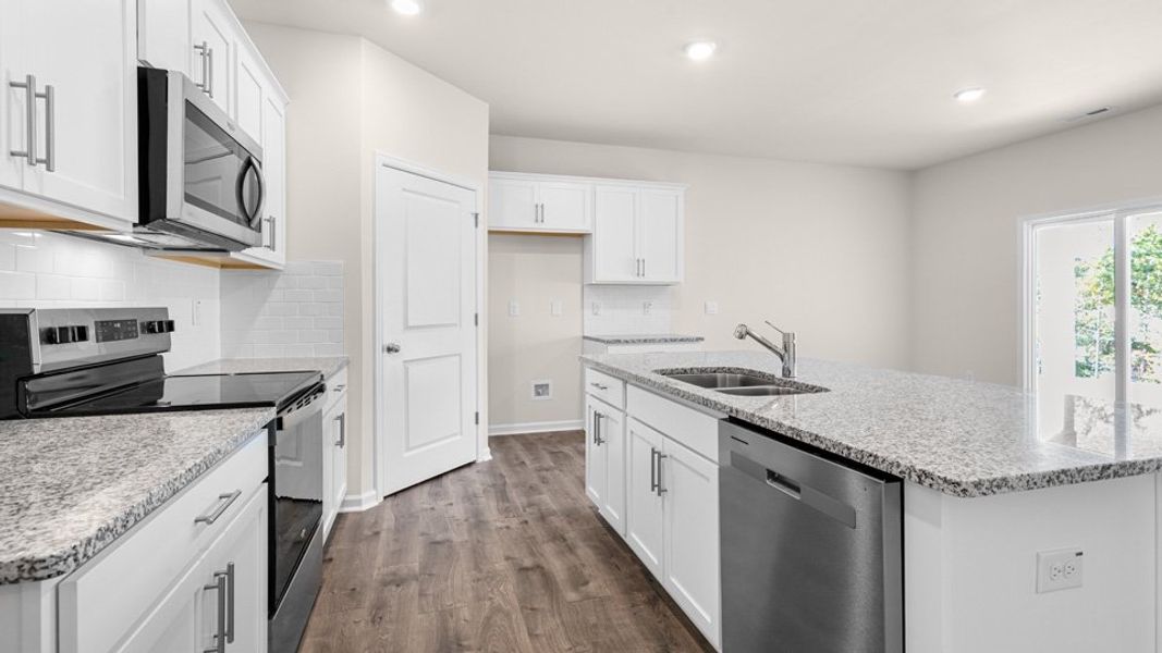 Furnished interior in a model home at Southbury in Carthage (Image 3).