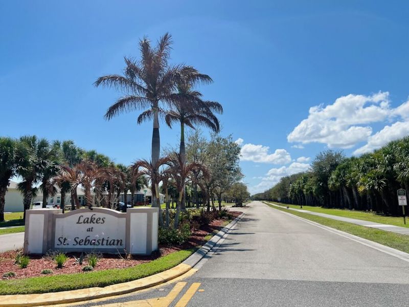 Entrance to the Lakes At St Sebastian community in Sebastian, FL, featuring signage and landscaping (Image 11).