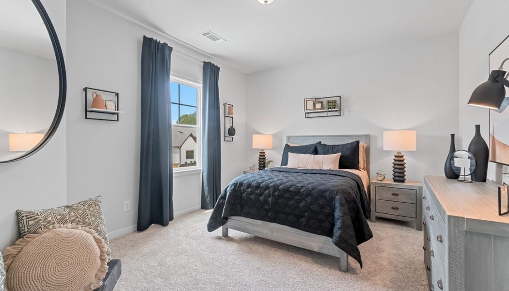 Furnished interior in a model home at Summerlin in Winder (Image 45).