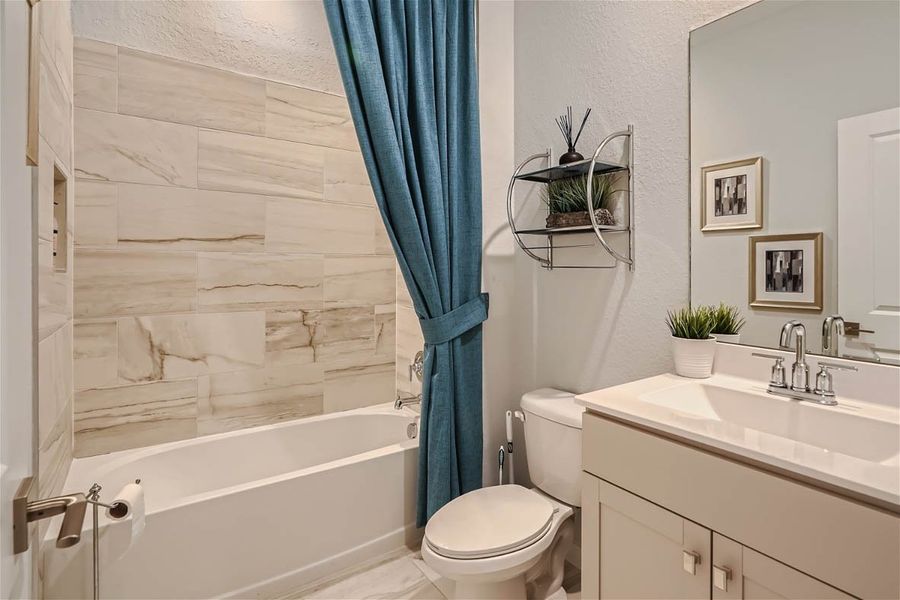 Furnished interior in a model home at Willow Pointe in Stuart (Image 43).