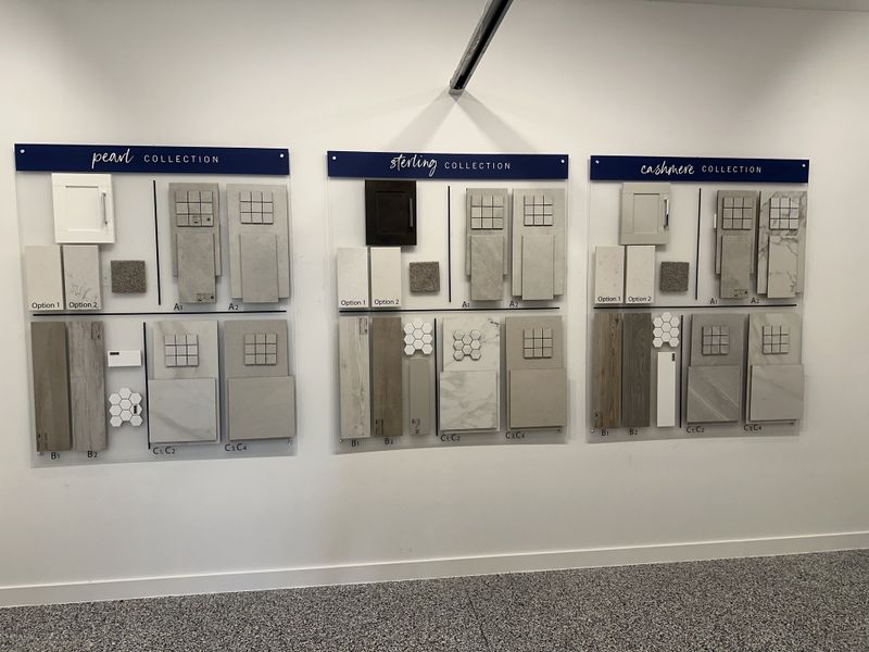 A selection board showcasing diverse design collections with various textures and finishes for home interiors.