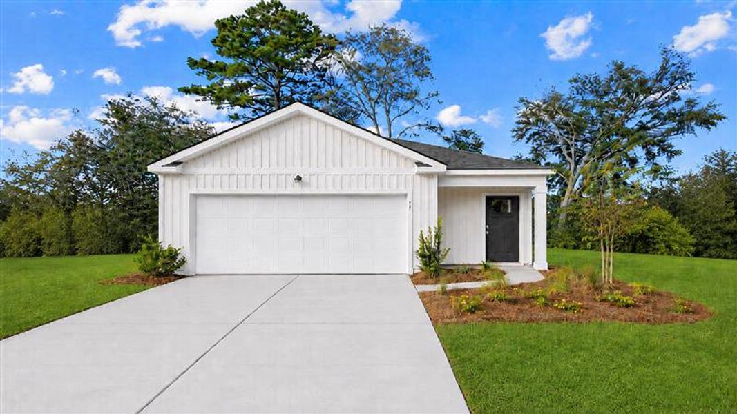 Front exterior of a home in the The Groves at Bees Creek community, located in Ridgeland, SC (Image 2).