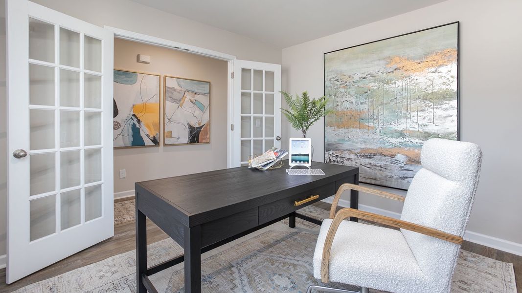 Furnished interior in a model home at Edinborough in Gibsonville (Image 17).