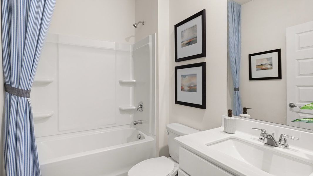 Furnished interior in a model home at Preserve at Dove Creek in Statham (Image 16).