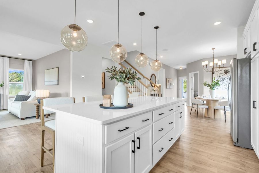 Furnished interior in a model home at Reeves Crossing in St. George (Image 4).