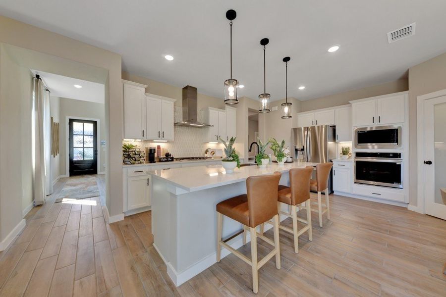 Furnished interior in a model home at Veranda Designer in San Antonio (Image 8).